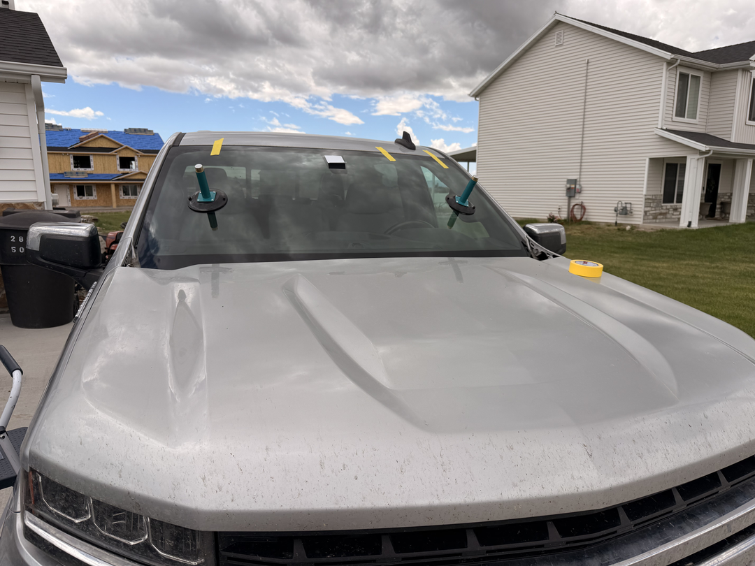 Windshield installation in progress